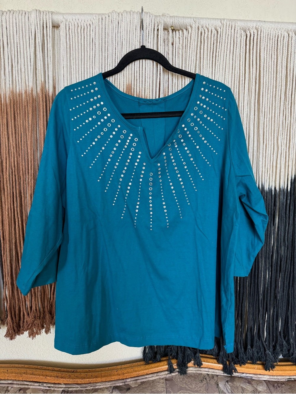 Blue 3/4 sleeve top with rhinestones and small grommet embellishments